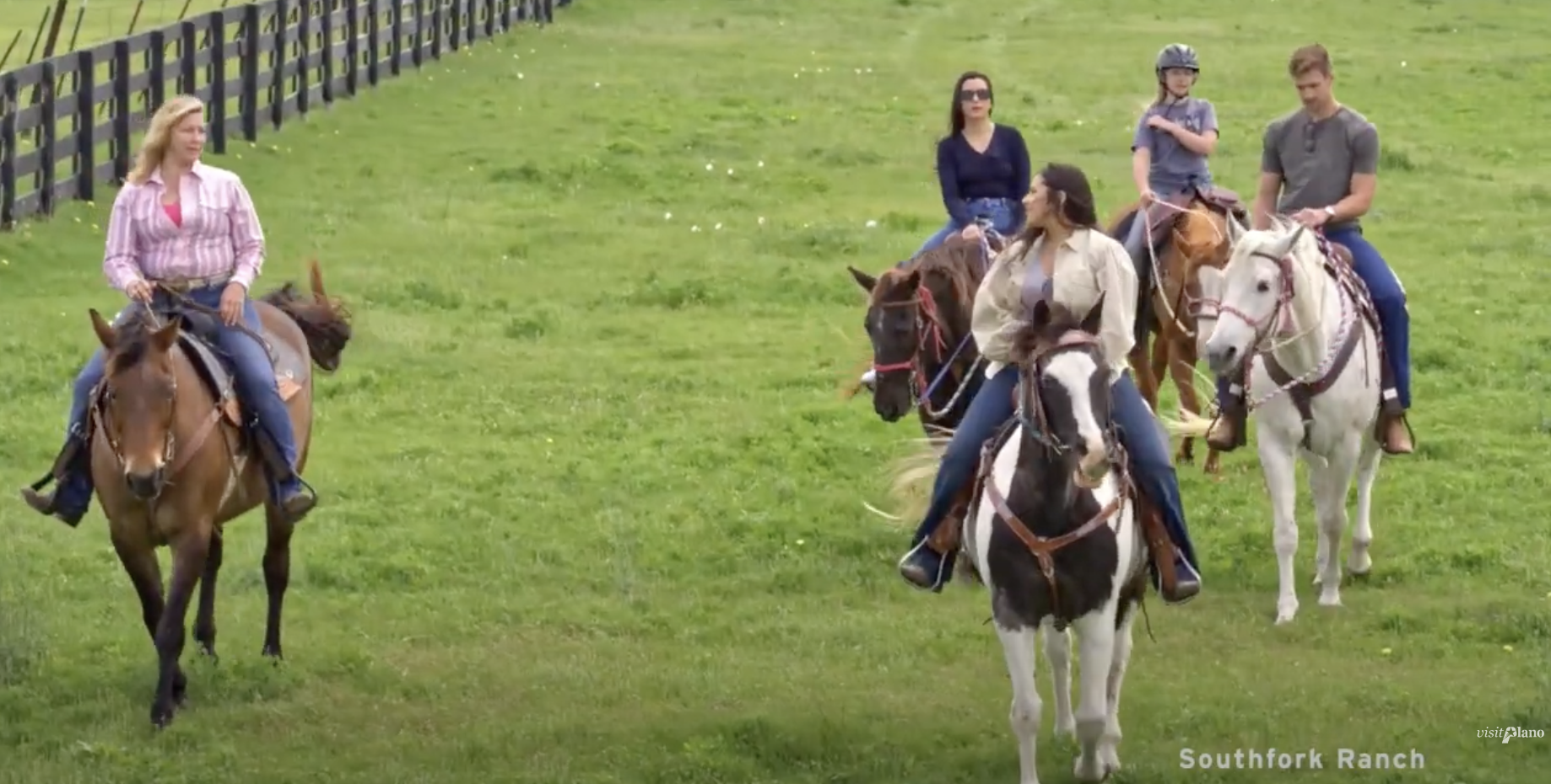 Group of people riding horses